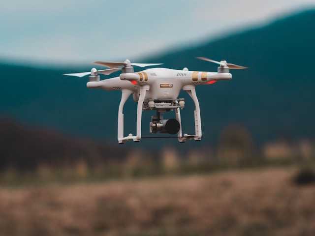 a drone flying midair outdoors