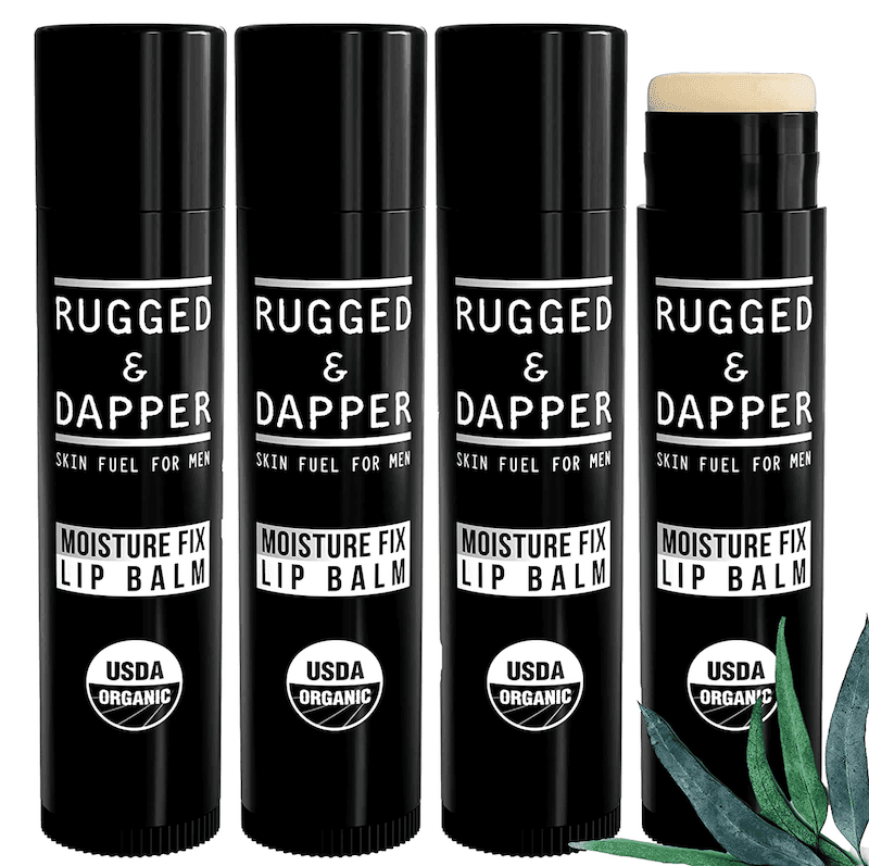 Four black chapsticks, one without the lid
