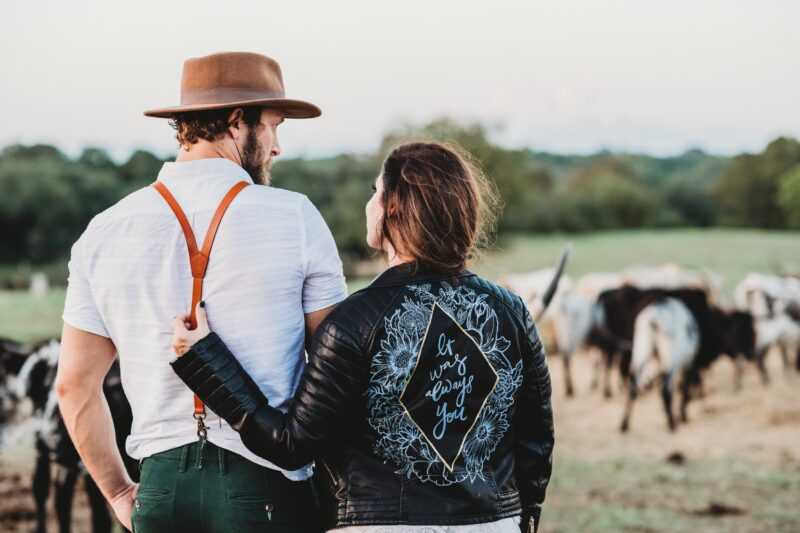 farmer and wife with cattle